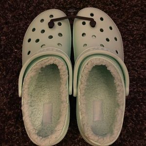 Crocs.  Brand new! W-12 M-10
